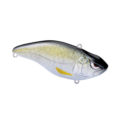 The SPRO Aruku Shad Silent lipless crankbait mimics a small fish with its metallic silver body, yellow stripe, detailed scales, black top, and red eye. Equipped with Gamakatsu treble hooks at the front and bottom, it promises to enhance your fishing experience.