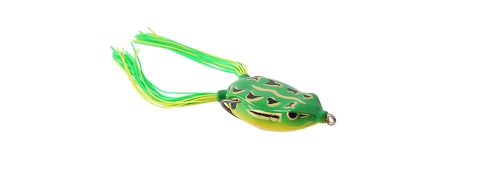 The SPRO Bronzeye Frog, designed by Dean Rojas, is a green and yellow frog-shaped lure with black spots. It includes long green and lime skirt tails and a Gamakatsu Hook, all set against a white background.