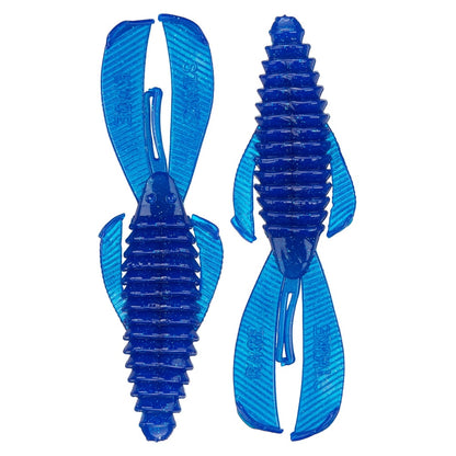 Two blue plastic toy figures, reminiscent of abstract insects or futuristic ships, feature ribbed bodies and wing-like appendages. They resemble Strike King Rage Bug creature bait by Strike King and are positioned facing opposite directions against a white background.