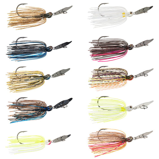 The image displays a bass angler's collection featuring ten varied fishing jigs, including bladed swim jigs like the Strike King Thunder Cricket Vibrating Jig. Each jig is decorated with a rubber skirt in bright colors such as brown, white, and blue and is arranged in two vertical columns for easy comparison.