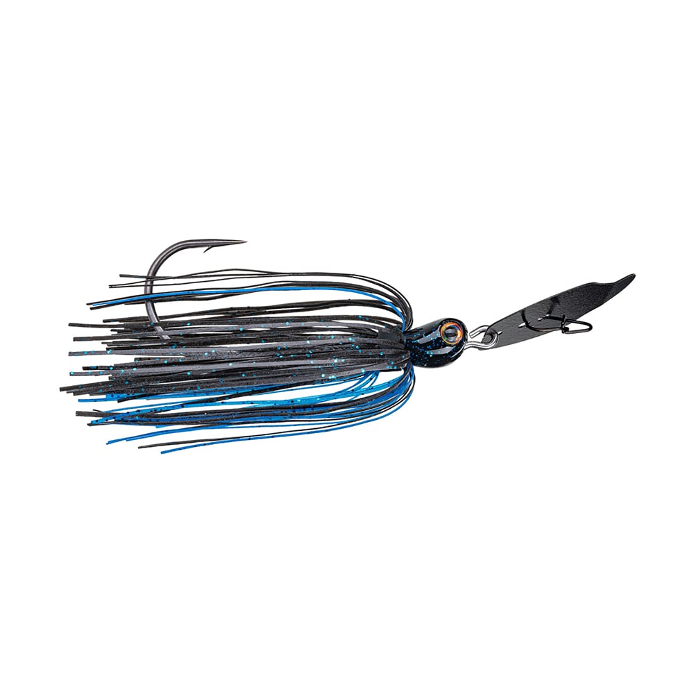 Introducing the Strike King Thunder Cricket Vibrating Jig, an essential addition for every bass angler. This bladed swim jig showcases a black and blue skirt with shimmering strands, featuring a metal hook and front blade for enhanced movement in the water.