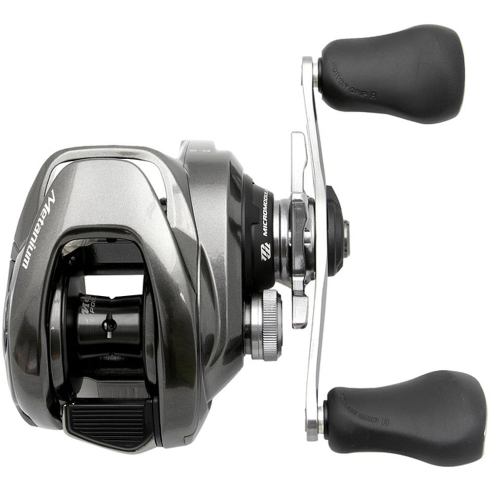 The Shimano Metanium MGL 150B 6.2:1 casting reel from American Legacy Fishing, with a Magnesium CoreSolid Body, boasts a sleek gray metallic design with black handles and visible adjustment knobs and levers, highlighting its intricate engineering.