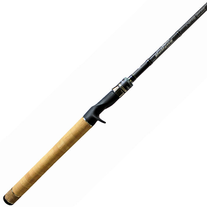 The Dobyns Xtasy 7'2" Medium Heavy Casting Rod | DRX 723C by americanlegacyfishing has a cork handle, black reel seat, and dark shaft with white and silver accents. It features Fuji Torzite guides for smooth casting, making it ideal for versatile fishing.