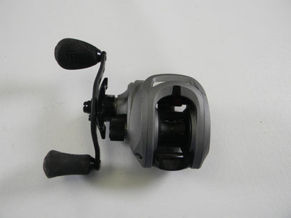 The 13 Fishing Inception IN8.1LH 8.1:1 LH is a silver and black used casting reel in very good condition, featuring dual handles and ergonomic grips for comfort. Ideal for the Rod and Reel Trade-In Program, it's an excellent choice to earn valuable store credit.