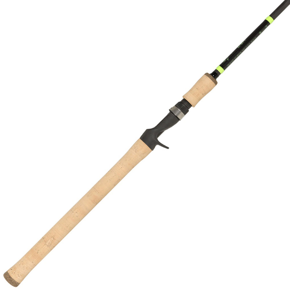 The G. Loomis E6X Steelhead 9000C HSR Mag-Light Ex-Fast Casting Rod features a sleek design with a long, light brown cork handle and black reel seat. Its slim black shaft has green accents near the handle, ideal for steelhead enthusiasts from americanlegacyfishing (Product ID: 12730-01).