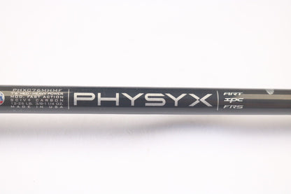 Close-up of a black St. Croix rod with "PHYSYX" in large letters. Specs like "PHXC76MHMF," "7'6" MED-HEAVY POWER," and "MOD. FAST ACTION" stand out, proudly made in the USA, featuring ART, IPC, and FRS—perfect for our Rod and Reel Trade-In Program with store credit options.