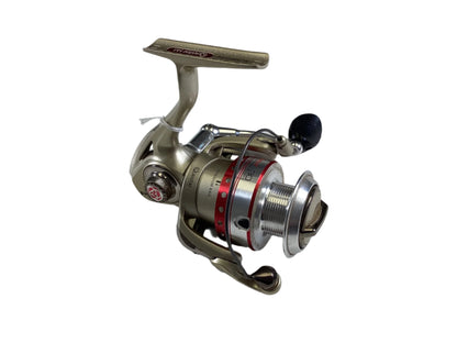 The Quantum Accurist 30 AC30PTI-F2 spinning reel in silver and red, with a sleek design and black handle, elegantly sits against a white background. Ideal for participants in the Nation's Best Rod and Reel Trade-In Program to receive store credit for used gear in very good condition.