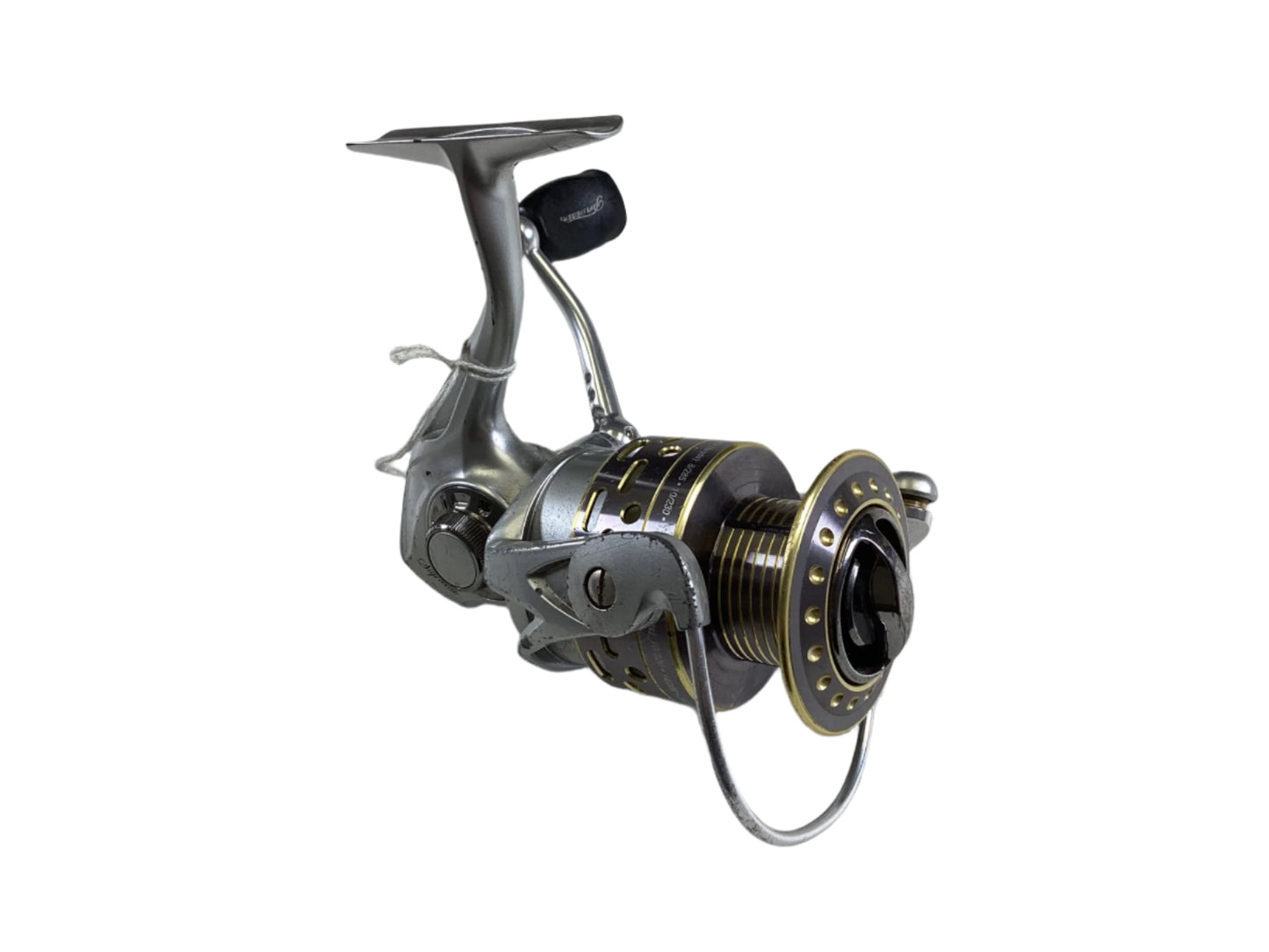 The Pflueger Supreme SUPSP40, a used spinning reel in fair condition, features a silver glossy finish with a crank handle, wire bail, and spool. It has black and gold accents and is ideal for our Rod and Reel Trade-In Program to earn store credit.