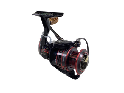 The Pflueger President Limited Edition PRESLESP35, a black and red spinning reel with handle, boasts a sleek design and modern details on white. Ideal for users upgrading gear through our Rod and Reel Trade-In Program. This used reel is in very good condition.