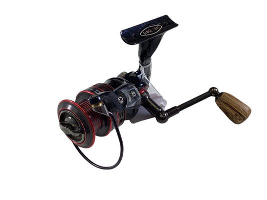 The Pflueger President Limited Edition PRESLESP35 is a black and red, used spinning reel in very good condition with a wooden handle, ideal for our Rod and Reel Trade-In Program.