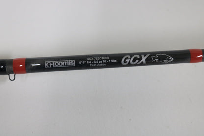 Close-up of the G. Loomis GCX 783C MBR casting rod in excellent used condition, featuring a 6'6" length, medium-heavy build, fast action, and specs of 1/4-3/4 oz lure weight and 10-17 lbs line rating, with black and red accents—ideal for our Rod and Reel Trade.