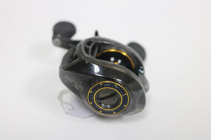 A Lew's Pro Speed Spool TLP1HZ 6.4:1 RH, a used casting reel in fair condition, displays its sleek black-and-yellow design and adjustment dials against a white background, tagged for those participating in our Rod and Reel Trade-In for store credit.