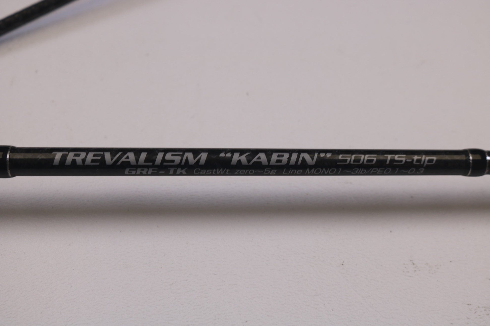 A close-up of the Breaden Glamour Rockfish Trevalism Kabin 506 TS-tip Ultra Light Rod, labeled "Cast Wt. 0-5g, Line MONO 3lb/PE 0.3," perfect for anyone considering new gear through our Rod and Reel Trade-In Program.