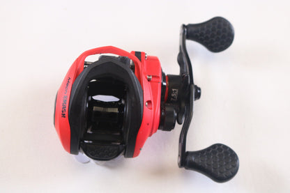 The Lew's Mach Smash SLP MHS1SH 7.5:1 RH is a used casting reel in good condition featuring a red and black design with dual handles, perfect for the Rod and Reel Trade-In Program to maximize store credit on quality gear.