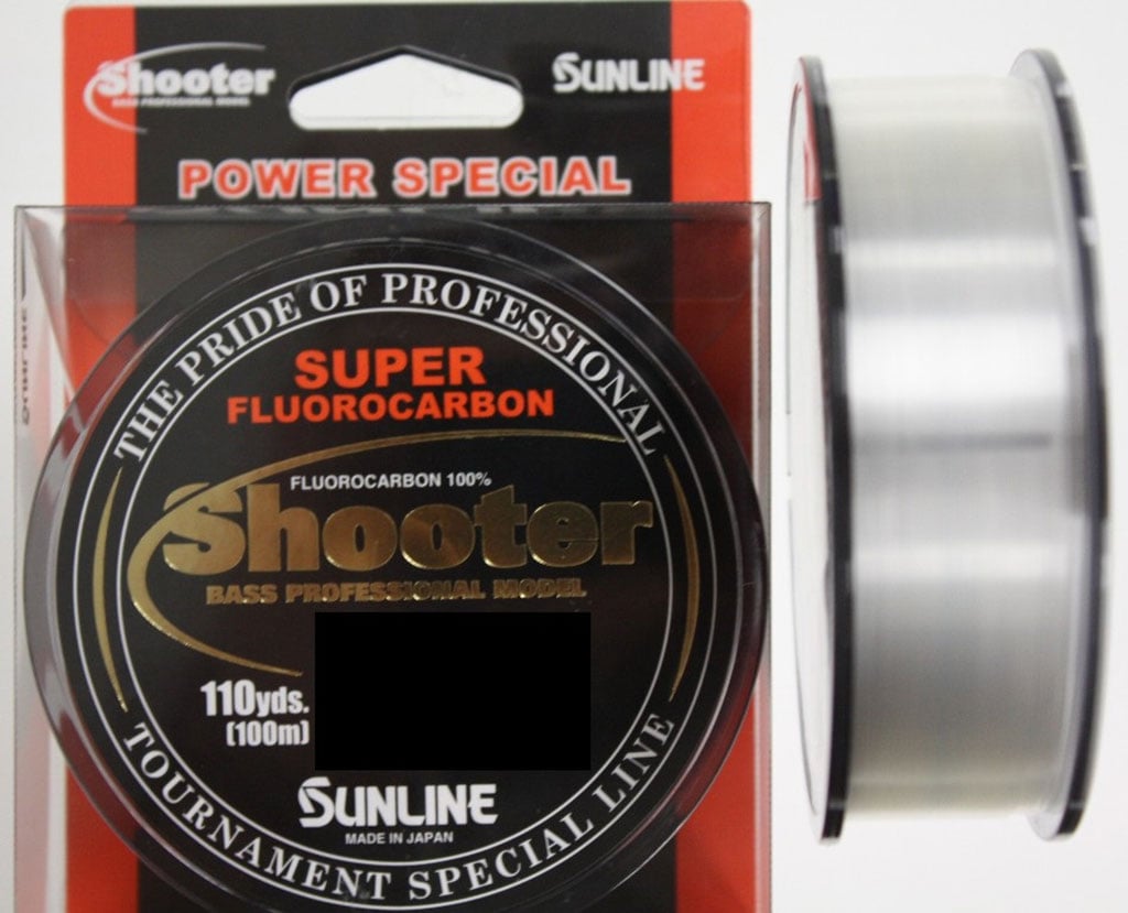 The Sunline Shooter Fluorocarbon Line is presented in stylish packaging, highlighting "Power Special" and "Tournament Special Line," offering 110 yards (100m) of line. Ideal for heavy cover applications, it features exceptional abrasion resistance.