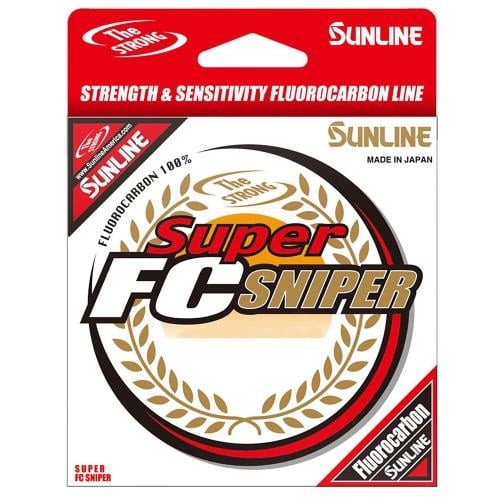 The packaging of Sunline Super FC Sniper 200yd/165yd Clear fluorocarbon fishing line features a white background with red accents. Highlighted by the words "Strength & Sensitivity," this Japan-made line offers exceptional abrasion resistance. A golden wreath surrounds the name "Sunline Super FC Sniper," making it ideal for use with spinning reels.