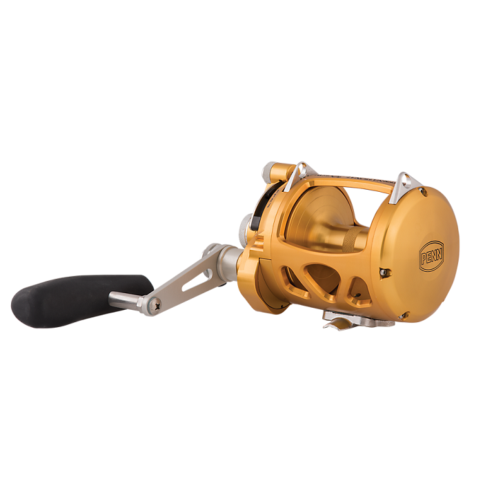 The americanlegacyfishing Penn International VISW 80, a gold and silver 2 Speed Conventional Reel with a black handle, features Lever Drag technology and durable metal construction, expertly designed for deep-sea adventures with intricate detailing for top performance.