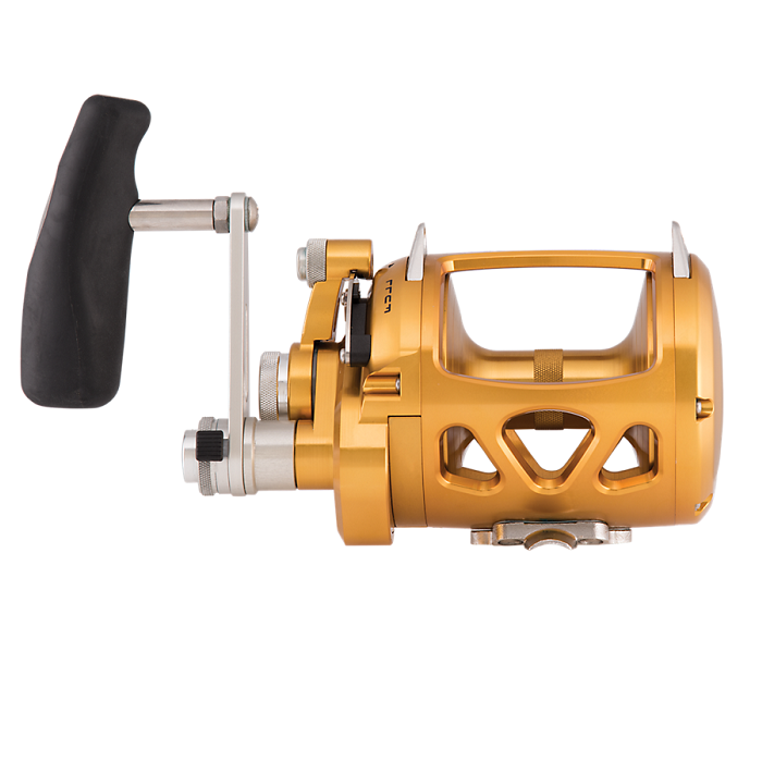 The Penn International VISW 80 2 Speed Conventional Reel by americanlegacyfishing is a gold reel with a black handle, metallic crank arm, robust construction, lever drag, and triangular cutouts. It offers precise adjustments with its various knobs.